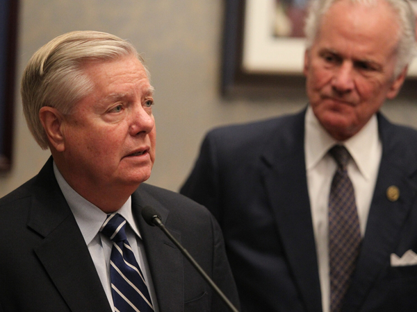 U.S. Sen. Lindsey Graham speaks as S.C. Gov. Henry McMaster looks on during a press conference in the governor’s office at the Statehouse in Columbia, South Carolina, on Aug. 9, 2022. (File photo by Travis Bell/STATEHOUSE CAROLINA/Special to the SC Daily Gazette)