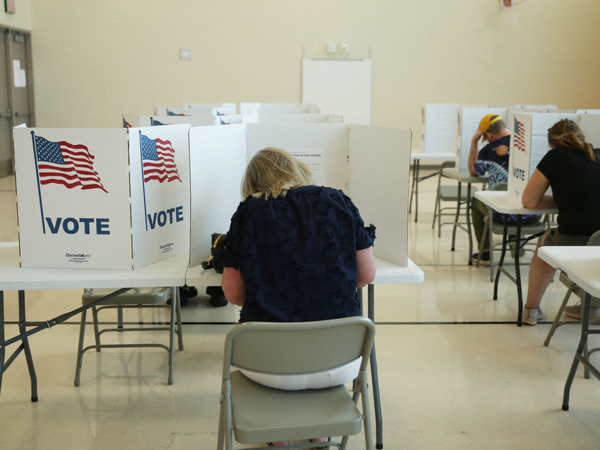Voters fill out their ballots at a Sioux Falls polling place during the South Dakota primary election on June 2, 2026. (Photo by Makenzie Huber/South Dakota Searchlight)