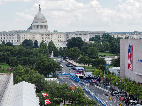 IndyCar drivers turned left on Pennsylvania Avenue, with the U.S. Capitol in the background, during the Freedom250 Grand Prix in Washington, D.C., on Sunday, Aug. 23, 2026. (Photo by Ashley Murray/States Newsroom)