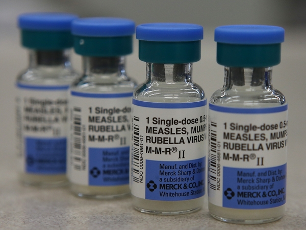 Vials of measles, mumps and rubella vaccine are displayed on a counter at a Walgreens Pharmacy on Jan. 26, 2015 in Mill Valley, California.  (Photo by Illustration Justin Sullivan/Getty Images)