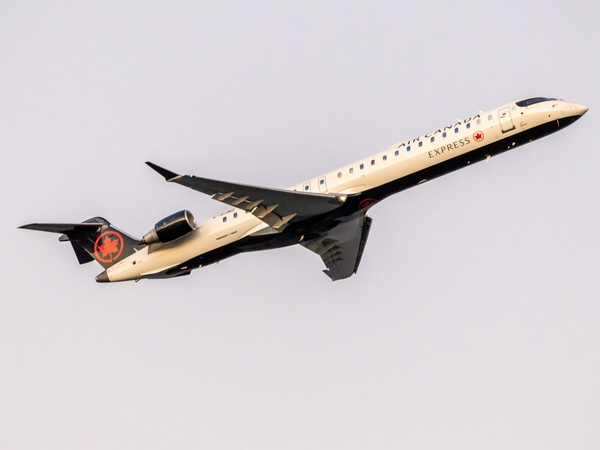 President Donald Trump has targeted Canadian airline manufacturer Bombardier in his trade war with Canada. In this photo, an Air Canada Express Bombardier CRJ900 aircraft departs Ronald Reagan Washington National Airport. (Photo by Getty Images/Yassine Bahammou)
