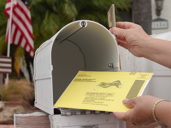 A U.S. Postal Service whistleblower in a report released Sept. 1, 2026, alleged that USPS rushed the development of electronic tools to comply with a Trump administration policy placing new restrictions on mail-in voting. (Photo by Simone Hogan/Getty Images)