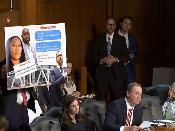 Sen. Eric Schmitt, R-Mo., speaks during a U.S. Senate Judiciary Committee hearing while a poster is displayed purporting to show text messages between former special counsel Jack Smith and security personnel about his attendance at an Atlanta Hawks NBA game. Smith actually had attended a University of Iowa Hawkeyes women's basketball game. (Screenshot from Judiciary Committee webcast)