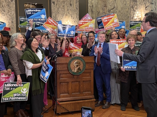 Income tax signed in Washington with a legal challenge close behind