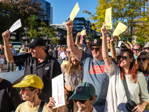 In Salt Lake City, No Kings marchers carry ballots to drop boxes