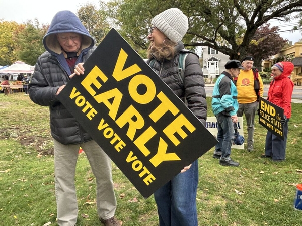 No Kings volunteers bring early voting message to Hope Street Farmers Market in Providence