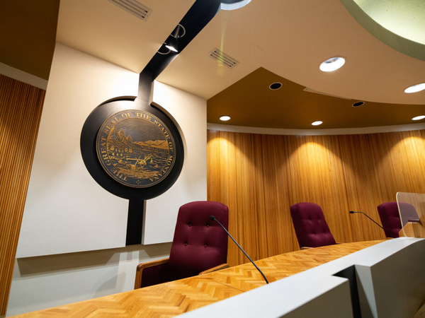 Former public defender disciplined in scheme to take a house