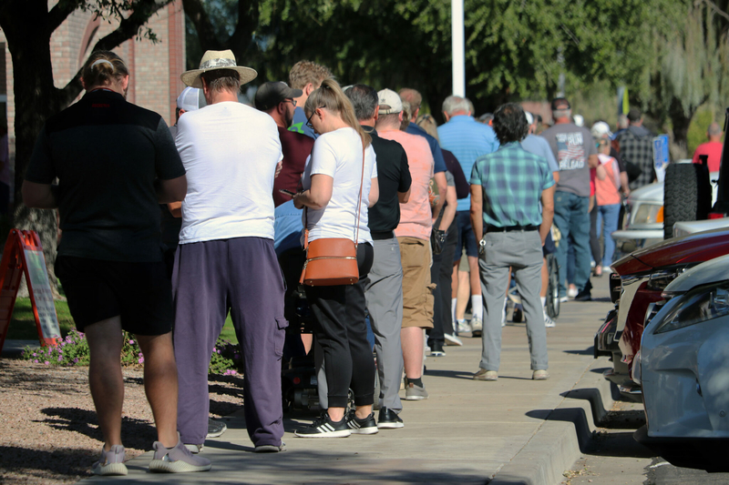 Voters wait in line at a Mesa polling location on Nov. 8, 2022. (Photo by Jerod MacDonald-Evoy/Arizona Mirror)