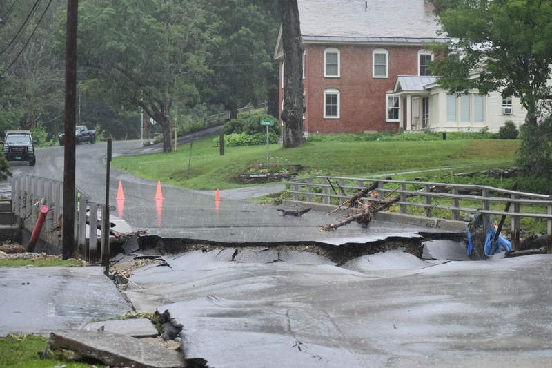 Flooding destroyed the bridge at Lawrence Hill Road in Weston’s village center on July 10, 2023. Photo by Patrick Crowley/VTDigger