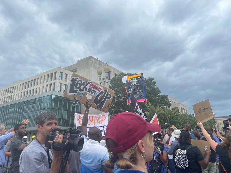 Protestors outside the courthouse where former President Donald Trump was arraigned on Aug. 3, 2023. (Ariana Figueroa/States Newsroom)