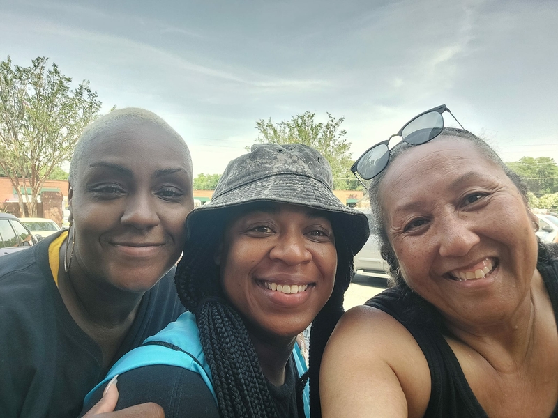 Mandisa Thomas, left, Moji Alawode-El, center, and Tina Marshall, right, volunteer as clinic defenders at A Preferred Women’s Health Center just outside Atlanta in July. Marshall is the founder of the Black Abortion Defense League and Thomas is the founder of Black Nonbelievers. Alawode-El is marketing manager with Abortion Access Front.
