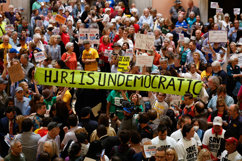 Hundreds of protesters fill the rotunda before the Ohio House session, May 10, 2023, at the Statehouse in Columbus, Ohio. (Photo by Graham Stokes for Ohio Capital Journal. Republish photo only with original story.)