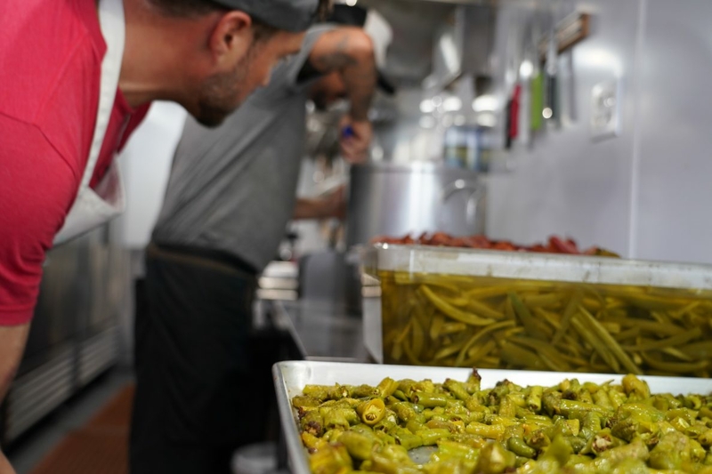 Chefs at Hua Momona Foundation prepare meals for those who need them across the fire-affected communities whose worlds were upturned during the Aug. 8 fires. (Thomas Heaton/Civil Beat/2023)