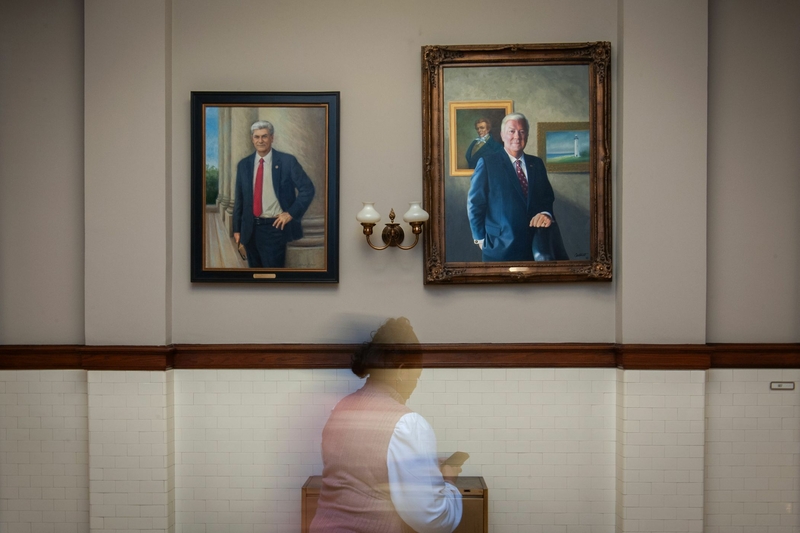 A portrait of Mr. Barbour, right, at the State Capitol in Jackson. He was Mississippi’s governor from 2004 to 2012.