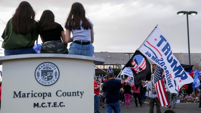 Supporters of President Donald Trump demonstrate at a “Stop the Steal” rally in front of the Maricopa County Elections Department office on Nov. 7, 2020. Arizona's attorney general announced the indictments on April 24 against 18 people, seven of whose names are redacted. Multiple news organizations have used details in the indictment to identify RNC senior counsel for election integrity Christina Bobb, as well as the other six. (Photo by Mario Tama/Getty Images)