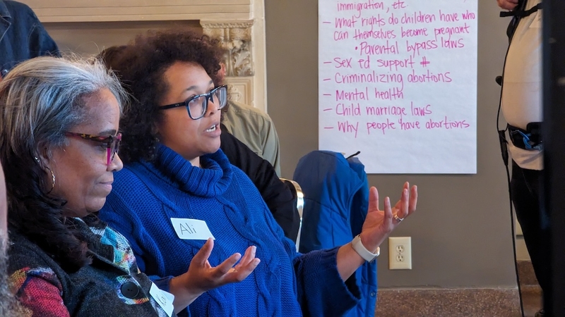 Ali Muldrow, who is a mother of three girls and runs an abortion fund in Wisconsin, told the group about how Black women are more likely to die in childbirth than white women and spoke of her own difficult pregnancies. (Baylor Spears/Wisconsin Examiner)