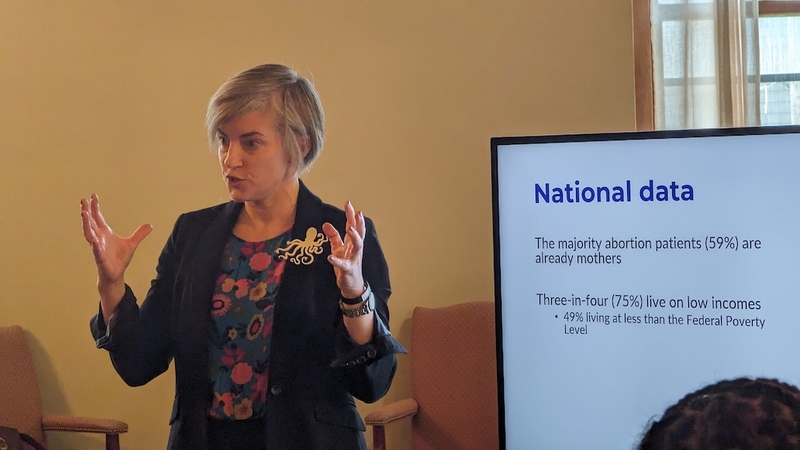 University of Wisconsin-Madison obstetrics and gynecology professor Jenny Higgins presents U.S. reproductive health data to the Wisconsin 14 on day one of the Wisconsin Citizen Solutions on Abortion &amp; Family Well-Being, December 8, 2023. (Baylor Spears/Wisconsin Examiner)