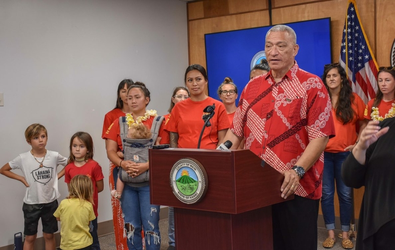 Maui Mayor Richard Bissen, flanked by members of Lahaina Strong, announced a bill Thursday that would eliminate more than 7,000 short-term rentals on Maui by 2026. (Cammy Clark/Civil Beat/2024)