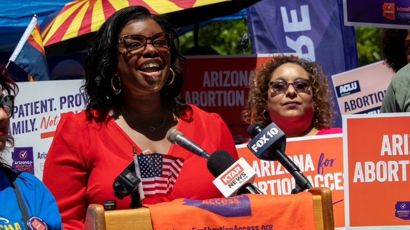 Chris Love, spokesperson for the Arizona for Abortion Access campaign, spoke at an April 17 news conference in Phoenix. In an interview, Love said a history of miscarriages and an abortion as a teenager led her to advocate for reproductive rights. (Jerod MacDonald-Evoy/Arizona Mirror) 