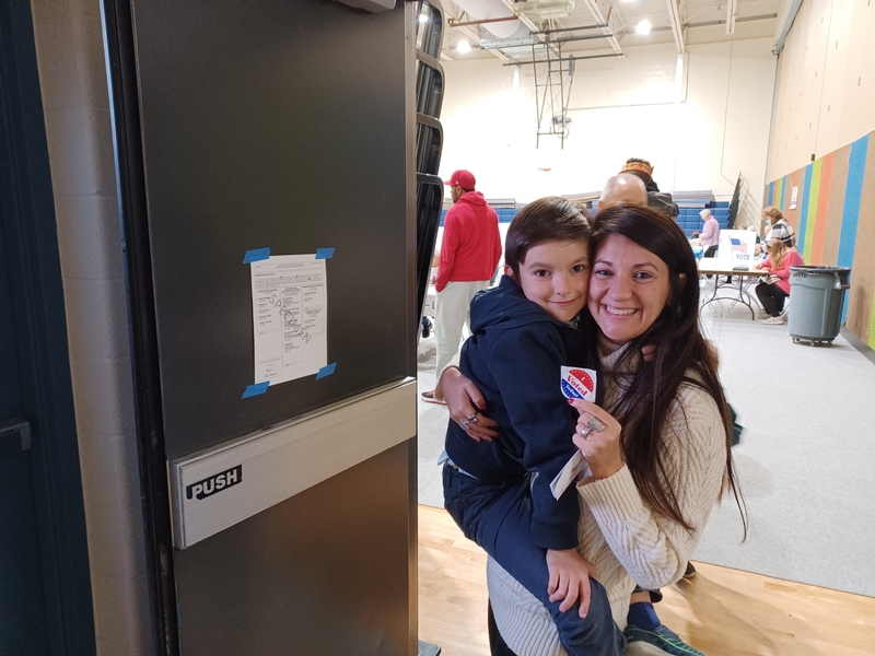 Laila Martin Garcia celebrates voting for the first time with her son in Harrisburg, Pennsylvania, on Nov. 8, 2022. Martin Garcia, originally from Spain, became a naturalized citizen after moving to the U.S. with her young family. This year will be the first time she casts a ballot in a U.S. presidential election. (Photo courtesy of Laila Martin Garcia)