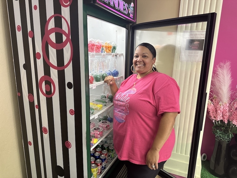 Kristie Hilliard opened her new shop, Kristie Kandies, in downtown Rocky Mount, N.C., after getting tired of her factory job at the local Pfizer plant. She’s seen a steady flow of customers, but says she’s doesn’t think either Vice President Kamala Harris or former President Donald Trump would change her economic fortunes. (Kevin Hardy/Stateline)