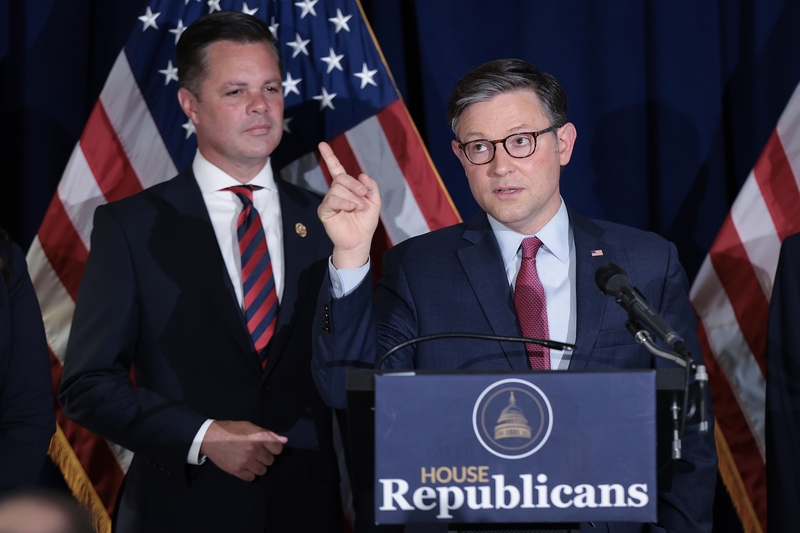 Speaker of the House Mike Johnson, R-La., on Wednesday issued an order banning transgender women from using women's bathrooms in some parts of the U.S. Capitol. In this photo, Johnson, right, answers questions during a press conference with Republican leadership on Capitol Hill on Sept. 18, 2024 in Washington, D.C. At left is Rep. Zach Nunn, R-Iowa. (Photo by Win McNamee/Getty Images)