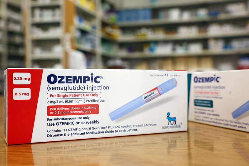 The Biden administration is proposing to cover drugs like Ozempic, which is used to treat heart disease, diabetes and obesity, under Medicare and Medicaid. (Photo illustration by Mario Tama/Getty Images)