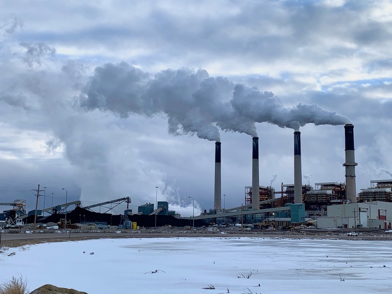 Conveyors pile coal at the Jim Bridger power plant outside Rock Springs on Jan. 19, 2022. (Dustin Bleizeffer/WyoFile)