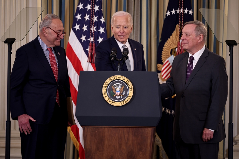 President Joe Biden is joined by Senate Judiciary Committee Chairman Richard Durbin, D-Ill., right,  and Senate Majority Leader Charles Schumer, D-N.Y., during a celebration of their work to appoint a record number of federal judges in the State Dining Room at the White House on Jan. 2, 2025 in Washington, D.C.  (Photo by Chip Somodevilla/Getty Images)