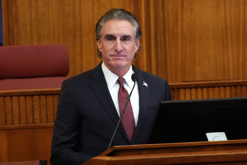 Former North Dakota Gov. Doug Burgum participates in a swearing-in ceremony of state lawmakers on Dec. 2, 2024, in Bismarck, North Dakota, shortly before completing his term as governor. (Michael Achterling/North Dakota Monitor)