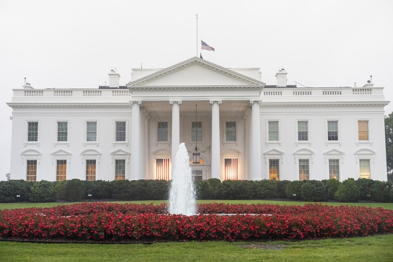Flags are draped on the North Portico of the White House, Sunday, Sept. 11, 2022, to commemorate September 11, 2001. (Official White House Photo by Adam Schultz)