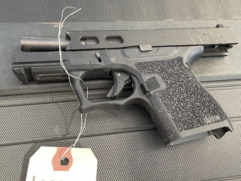 Ghost guns can look and function just like regular guns, but they lack serial numbers, making them difficult to trace. They also can be put together from parts ordered online or made at home through a 3D printer. (Madeleine Valera/Civil Beat/2024)