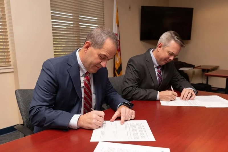Donald Owrey, left, President and CEO of Atlantic General Hospital, and Steven Leonard, President and CEO of TidalHealth, signed an intent to merge agreement in December and have been working through regulatory approval since. | PHOTO COURTESY OF AGH