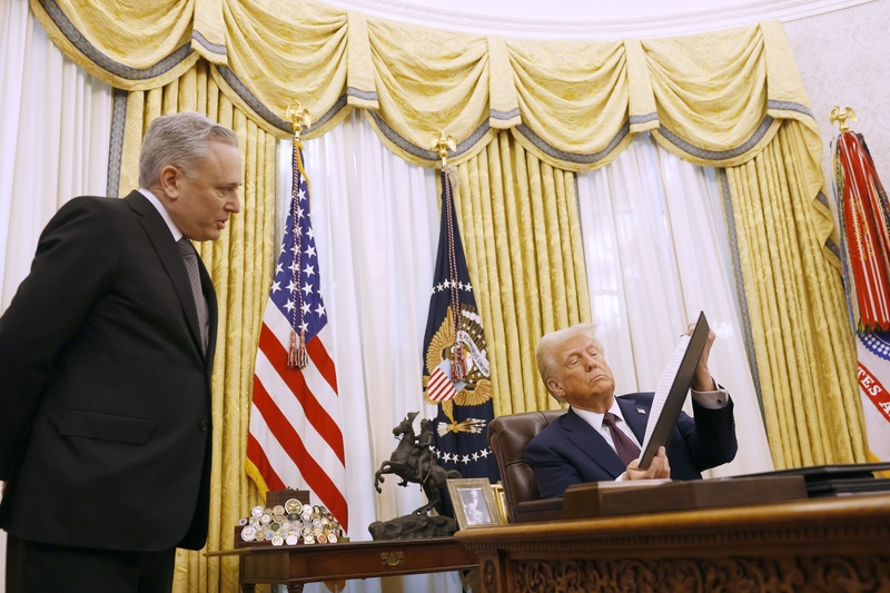 : David Sacks, U.S. President Donald Trump's "AI and Crypto Czar", speaks to President Trump as he signs a series of executive orders in the Oval Office of the White House on January 23, 2025 in Washington, DC. Trump signed a range of executive orders pertaining to issues including crypto currency, Artificial Intelligence, and clemency for anti-abortion activists. (Photo by Anna Moneymaker/Getty Images)