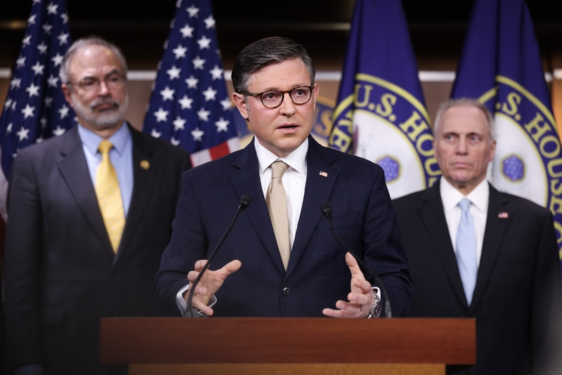 Speaker of the House Mike Johnson (R-LA) (C) speaks alongside Rep. Andy Harris (R-MD) (L) and House Majority Leader Steve Scalise (R-LA) (R) during a news conference at the U.S. Capitol on March 11, 2025 in Washington, DC. Congress members spoke about the House Republican Conference meeting, joint session of Congress, and various other topics. (Photo by Kayla Bartkowski/Getty Images)