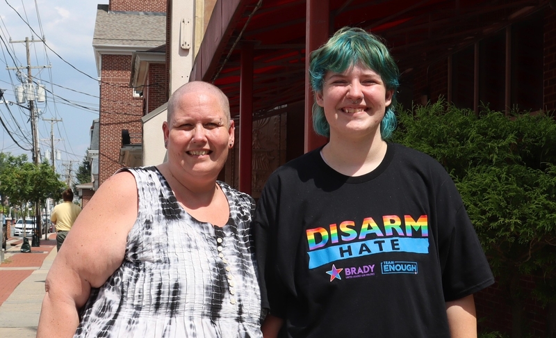 Atlas McGinnis, 15, (right) has spoken out about shrinking health services available to trans youth in Delaware.