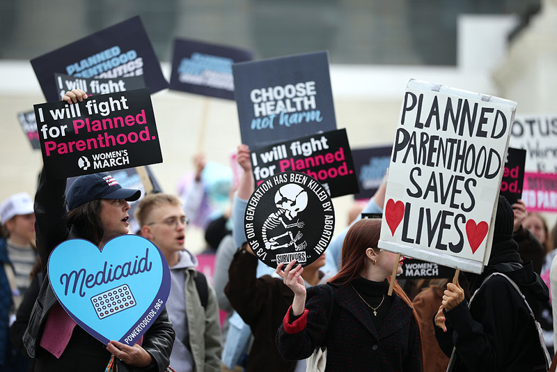 With a new law cutting Medicaid funding to certain clinics, Planned Parenthood estimated 200 of its clinics in 24 states are at risk of closure with the cuts, and nearly all of those clinics — 90% — are in states where abortion is legal. (Photo by Kayla Bartkowski/Getty Images)