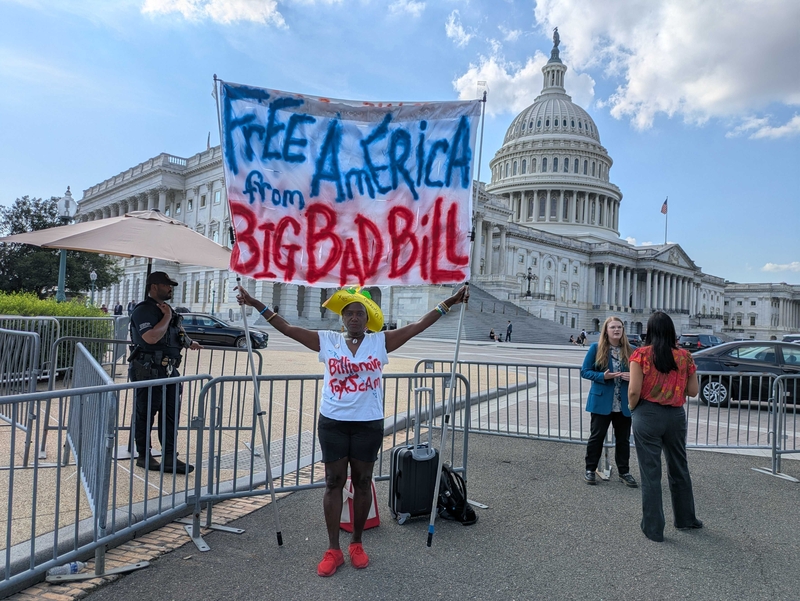 Nadine Seiler, 60, of Waldorf, Maryland, protested against the "big beautiful bill" outside the U.S. Capitol on Wednesday, July 2, 2025, as House Republicans were stalled in whipping enough votes for floor passage of the massive budget reconciliation bill. (Photo by Ashley Murray/States Newsroom)