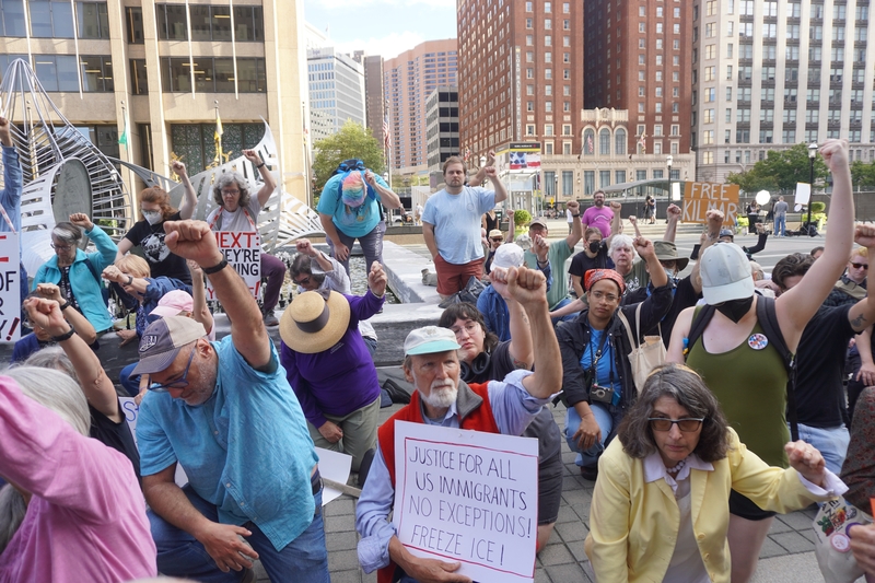A couple hundred people rallied Aug. 25 in support of Kilmar Abrego Garcia outside the the George H. Fallon Federal Building, where the ICE detention facility is located in Baltimore. (Photo by William J. Ford/Maryland Matters)