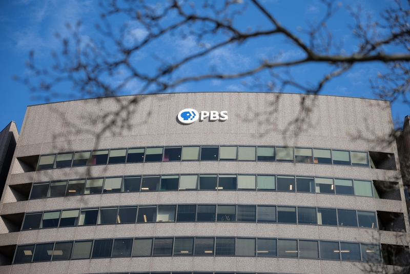 A sign for the Public Broadcasting Service  is seen on its building headquarters on Feb. 18, 2025 in Arlington, Virginia.  (Photo by Kayla Bartkowski/Getty Images)