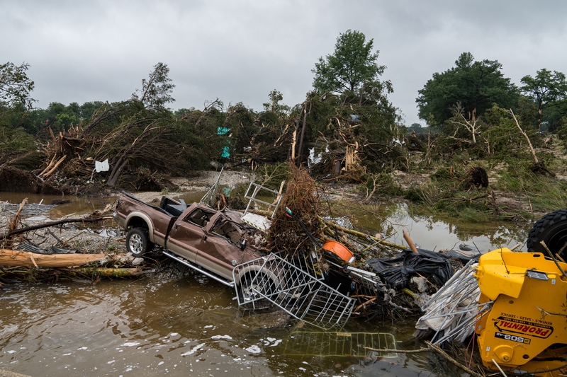 The Corporation for Public Broadcasting will no longer administer a grant program that provided millions of dollars to local television and radio stations to upgrade the equipment they use to send out emergency alerts to warn of impending natural disasters and more. In this photo, flood waters left debris including vehicles and equipment scattered in Louise Hays Park on July 5, 2025 in Kerrville, Texas. (Photo by Eric Vryn/Getty Images)