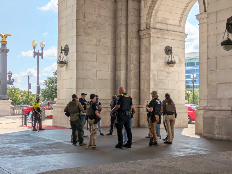 Law enforcement officials gather at Union Station, near the U.S. Capitol in Washington, D.C., on Tuesday, Aug. 12, 2025. (Photo by Ashley Murray/States Newsroom)