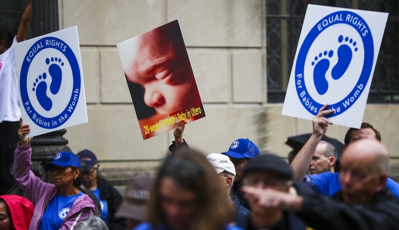 Protesters at an anti-abortion March for Life rally in Trenton, New Jersey, in late September. Although abortion makes up a small percentage of services provided by Planned Parenthood clinics nationwide, it is the justification for “defunding.” (Photo by Dana DiFilippo/New Jersey Monitor)