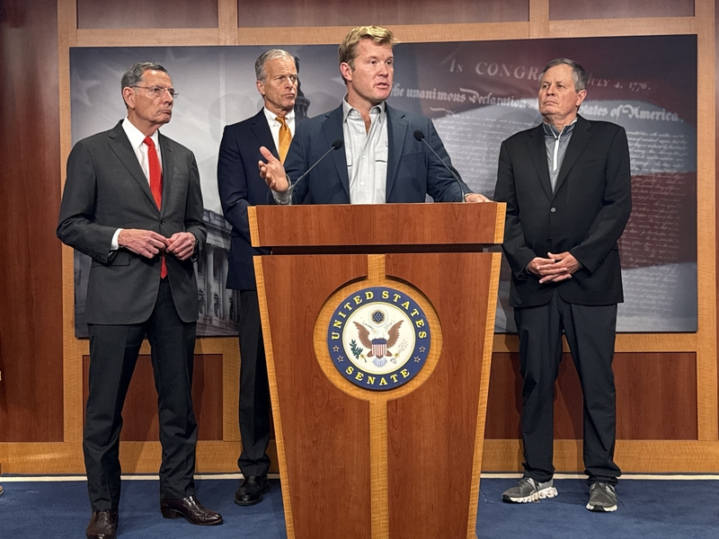 Montana Republican U.S. Sen. Tim Sheehy speaks with reporters inside the Capitol building in Washington, D.C., on Friday, Sept. 19, 2025. Also pictured, from left to right, are Senate Majority Whip John Barrasso, R-Wyo.; Senate Majority Leader John Thune, R-S.D.; and Montana Republican Sen. Steve Daines. (Photo by Jennifer Shutt/States Newsroom)