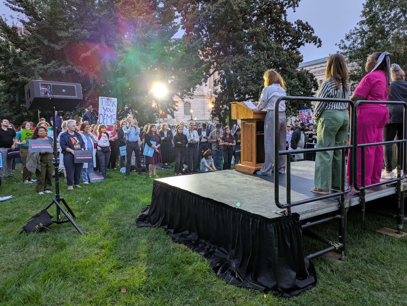 A rally-goer holds a sign reading "Thank you, Dems" at an event outside the U.S. Capitol on Tuesday, Sept. 30, 2025, where several Senate and House Democrats spoke on the issue of  rising health care costs. (Photo by Ashley Murray/States Newsroom)