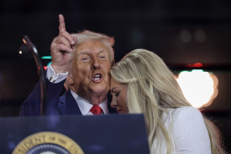 Erika Kirk joins U.S. President Donald Trump onstage during the memorial service for her late husband, conservative political activist Charlie Kirk,at State Farm Stadium on Sept. 21, 2025 in Glendale, Arizona.  (Photo by Win McNamee/Getty Images)