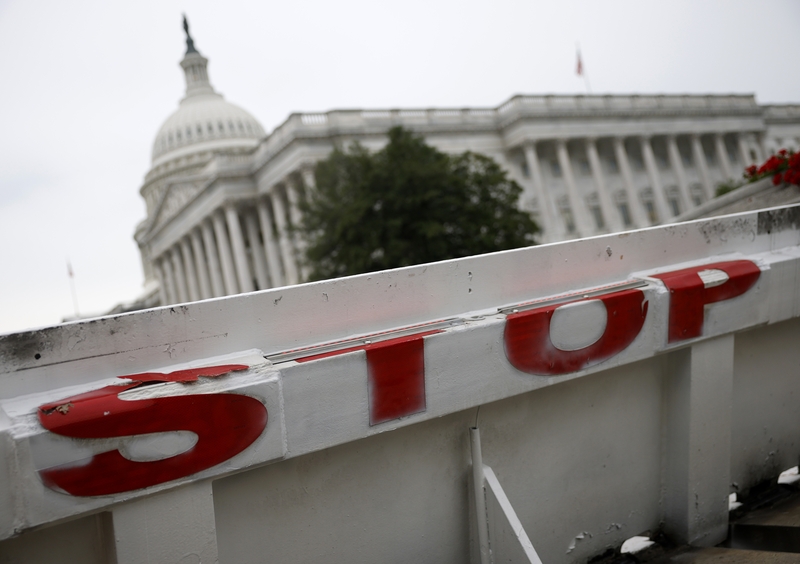 The U.S. Capitol is seen behind a barricade on Sept. 30, 2025 in Washington, DC. If lawmakers fail to reach a bipartisan compromise on the funding bill, the federal government shutdown will begin at midnight. (Photo by Kevin Dietsch/Getty Images)