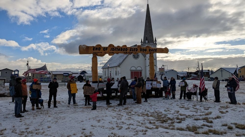 At least 25 communities across Alaska held rallies for No Kings day, from Southeast Alaska to the Arctic. In Nome, about two dozen protesters rallied under the historic Burled Arch marking the end of the Iditarod Trail Sled Dog Race. "I protested today for a bunch of reasons," said Hannah Anderson, a participant and 50-year resident of Nome. "I'm sick of this administration lying about anything they don't agree with, and seeing people detained without apparent cause."