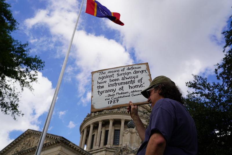 For the second time this year, demonstrators gathered on the south lawn of the Mississippi Capitol to protest President Donald J. Trump during a “No Kings” rally Saturday, Oct. 18, 2025, in Jackson. Credit: Richard Lake/Mississippi Today