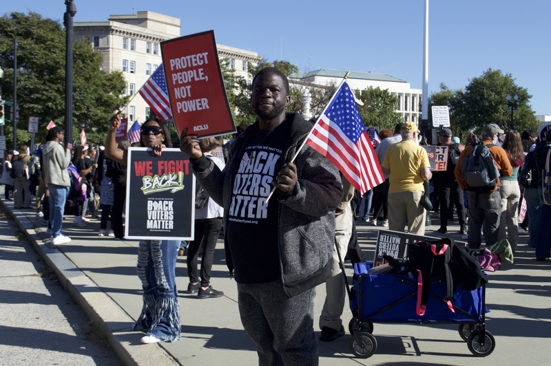 Brandon Parnell, 39, and Latoya Gaines, 40, both of Birmingham, Alabama, traveled to Washington, D.C., to demonstrate outside the U.S. Supreme Court on Wednesday, Oct. 15, 2025. (Photo by Ashley Murray/States Newsroom)